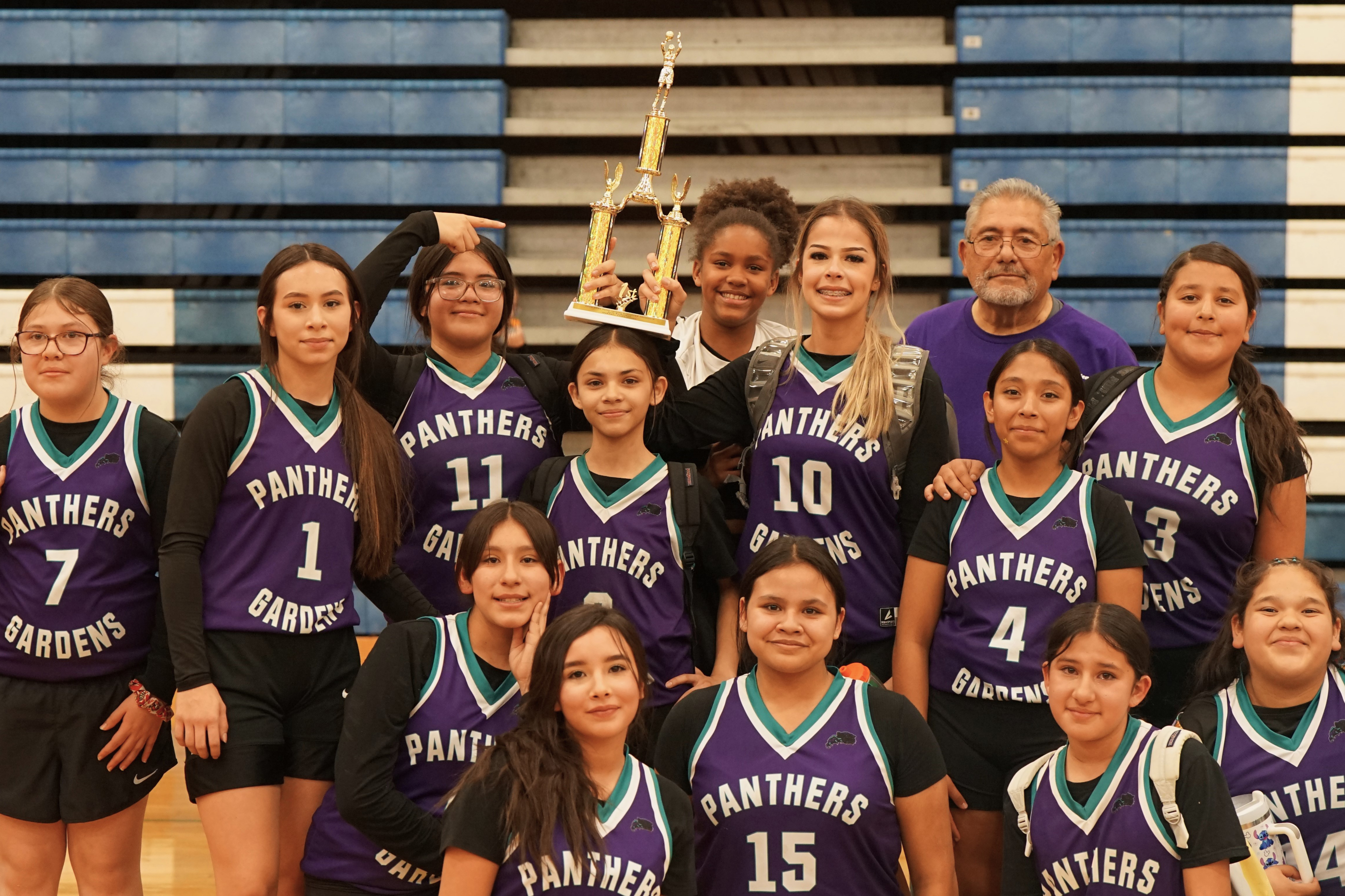 The Panthers pose with their trophy