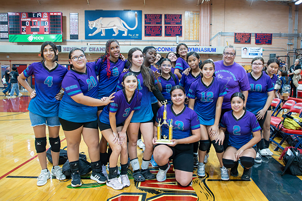Pueblo Gardens volleyball team with their second place trophy